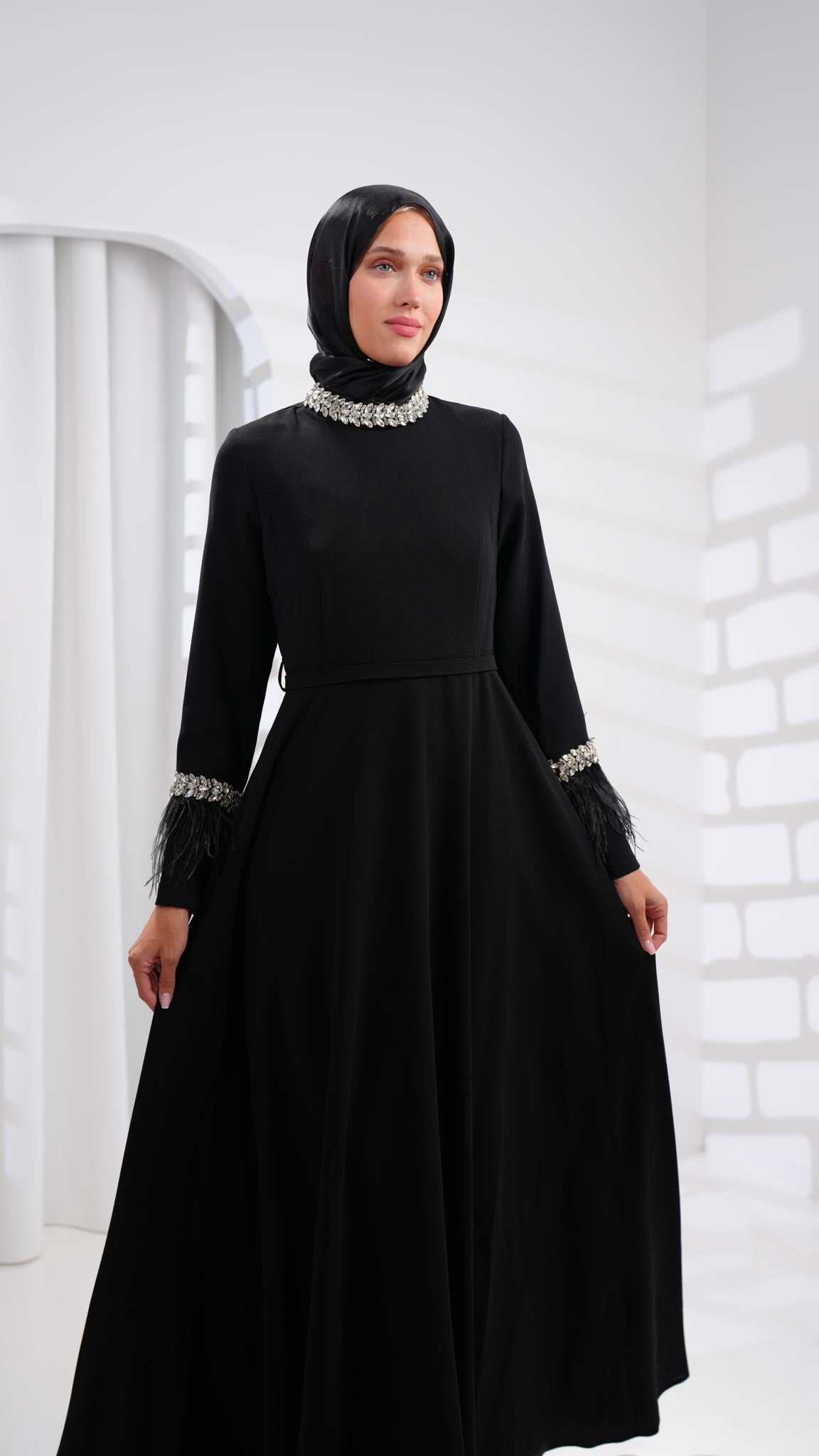 black abaya dress with leather and crystals on sleeves