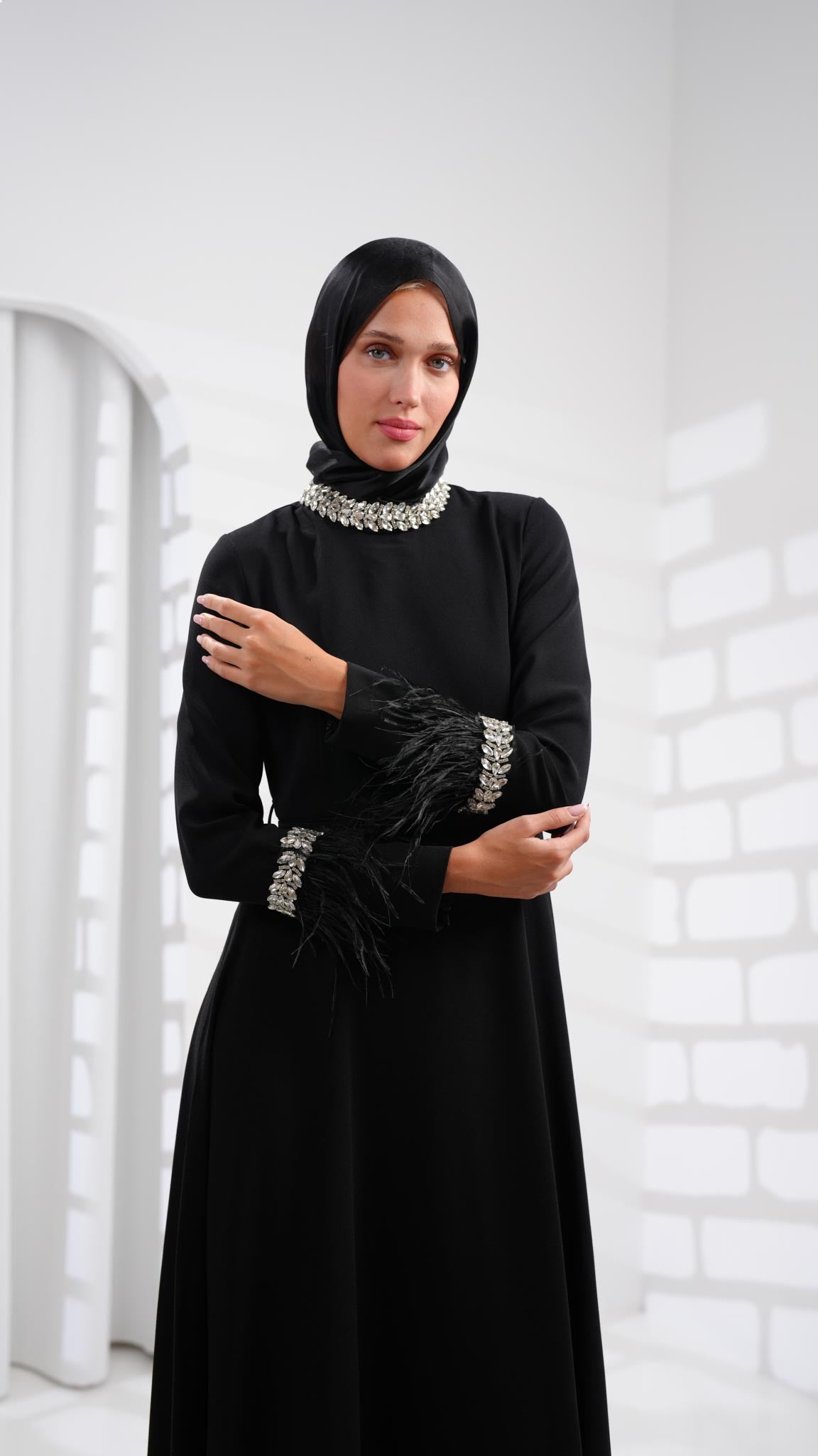 black abaya dress with leather and crystals on sleeves