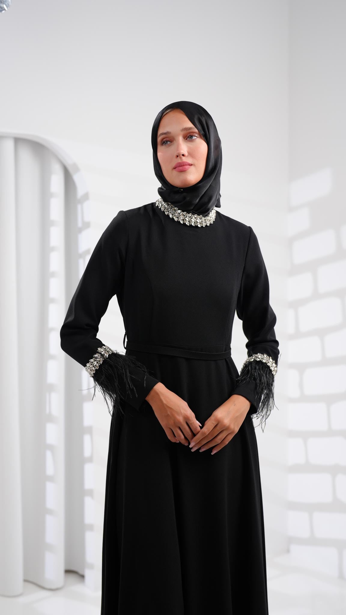 black abaya dress with leather and crystals on sleeves