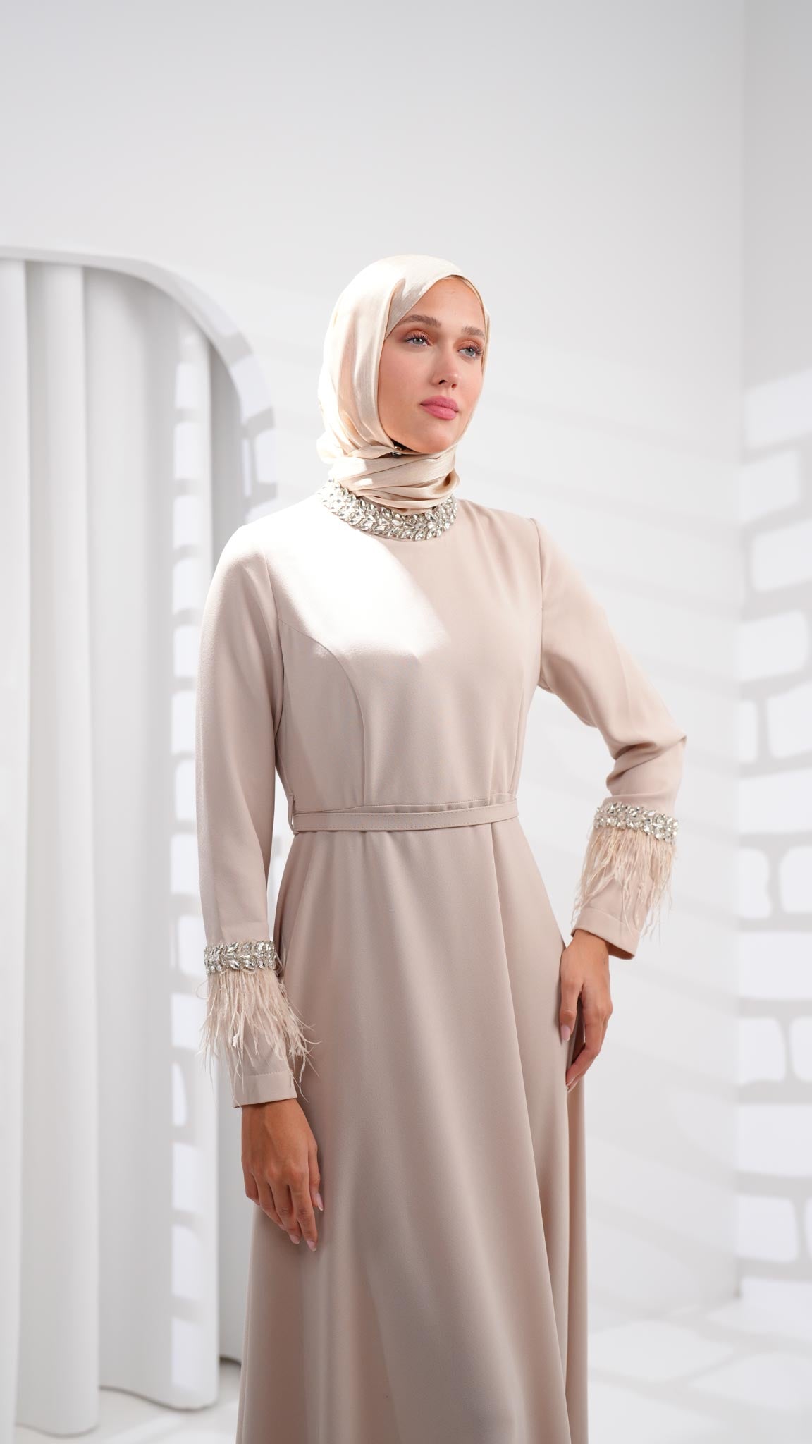 Beige abaya dress with leather and crystals on sleeves