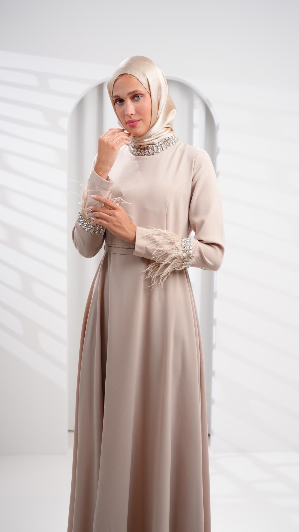 Beige abaya dress with leather and crystals on sleeves