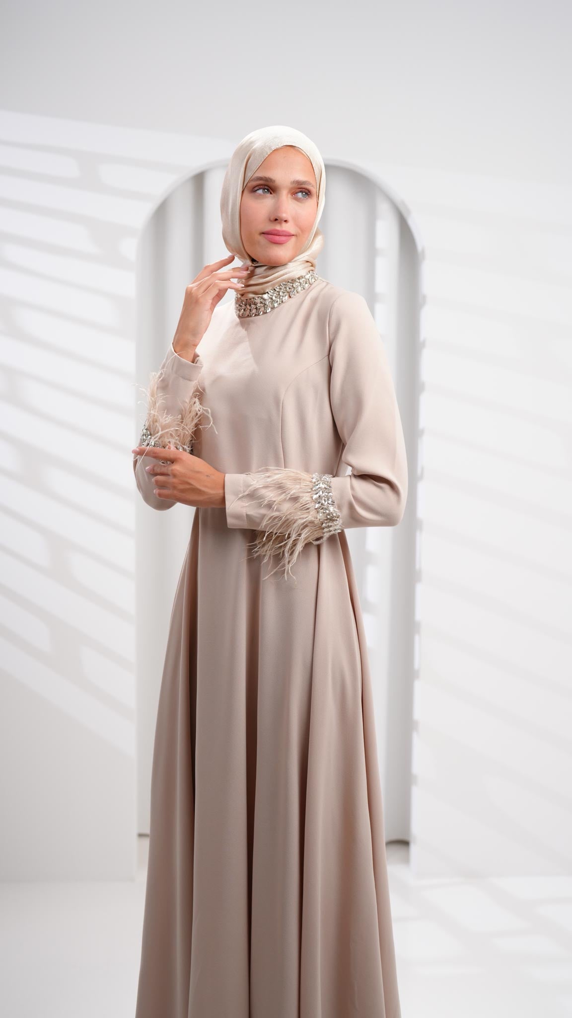 Beige abaya dress with leather and crystals on sleeves