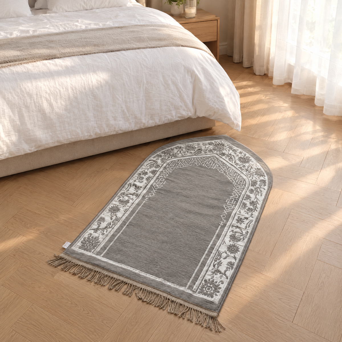 Floral Vault prayer mat at the foot of a bed