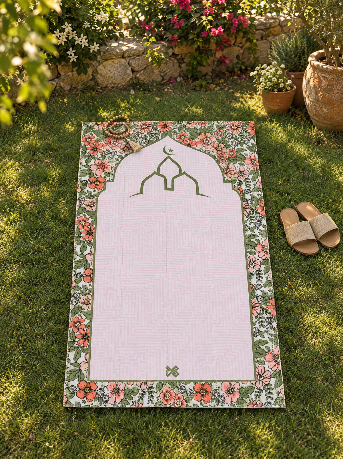 Portable prayer mat on the grass in a home garden