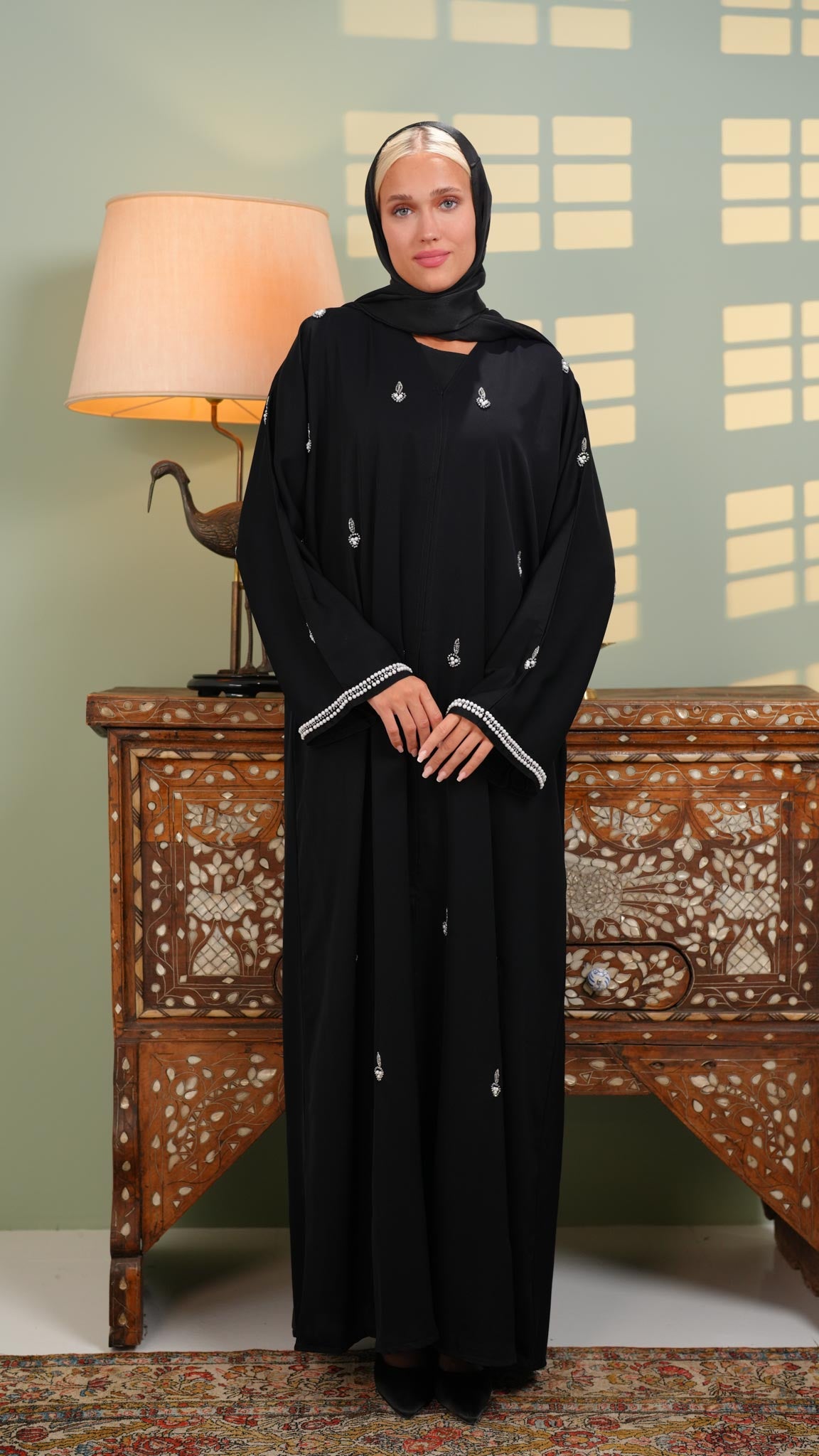 black khaliji abaya with white pearls on sleeves