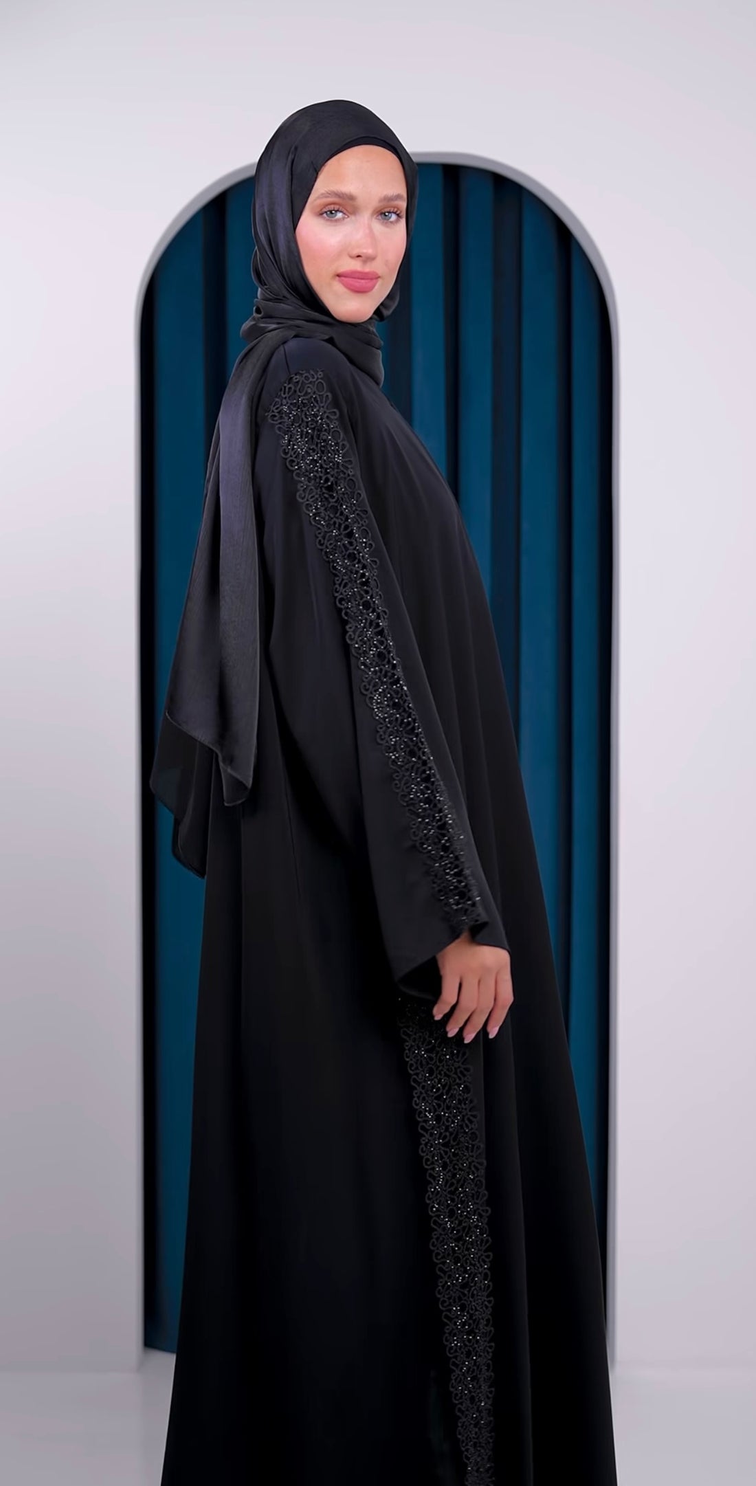 black khaliji abaya with lace trim on sleeves and sides