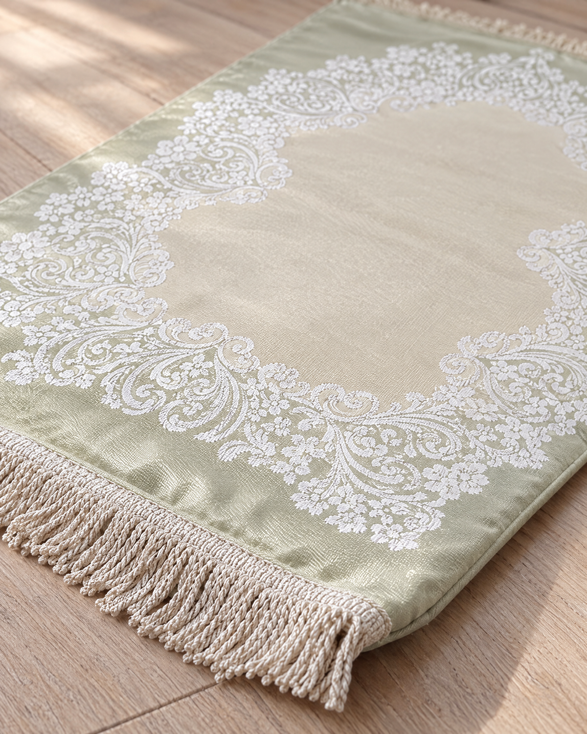 Close-up of the Lace Jacquard prayer mat border and padding