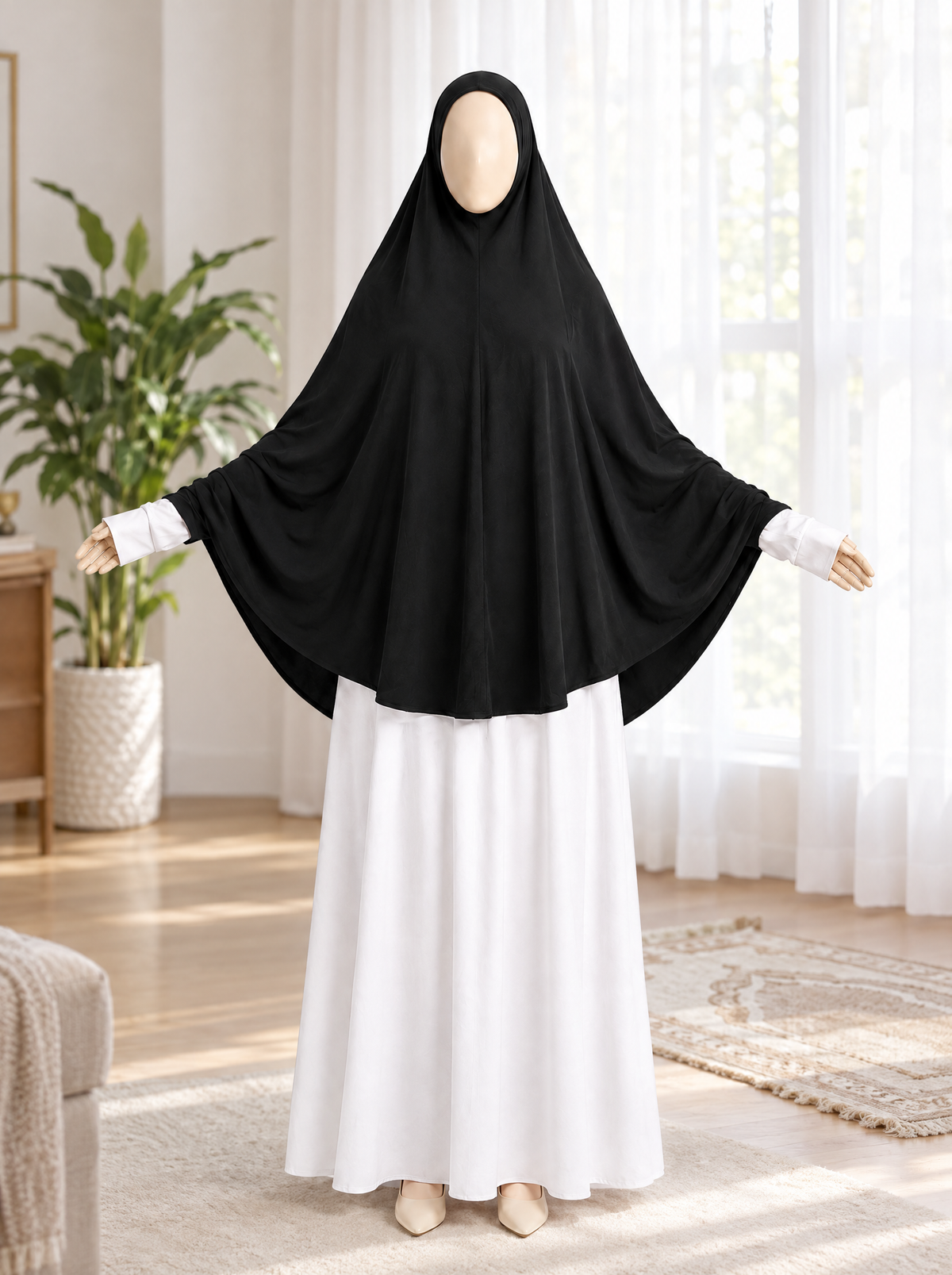 Black butterfly khimar with hands in a calm living room