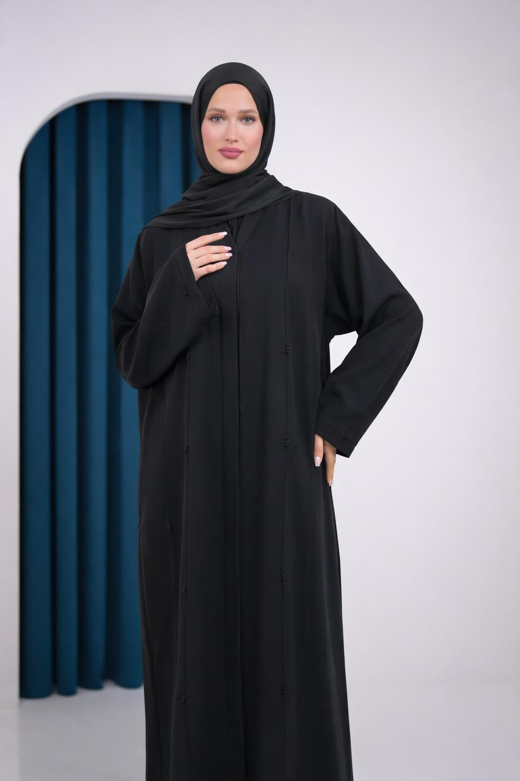 black khaliji abaya with tied beads